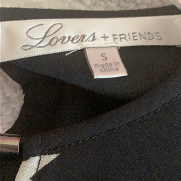 Lovers + Friends star print mini dress. Size S - Picture 7 of 7